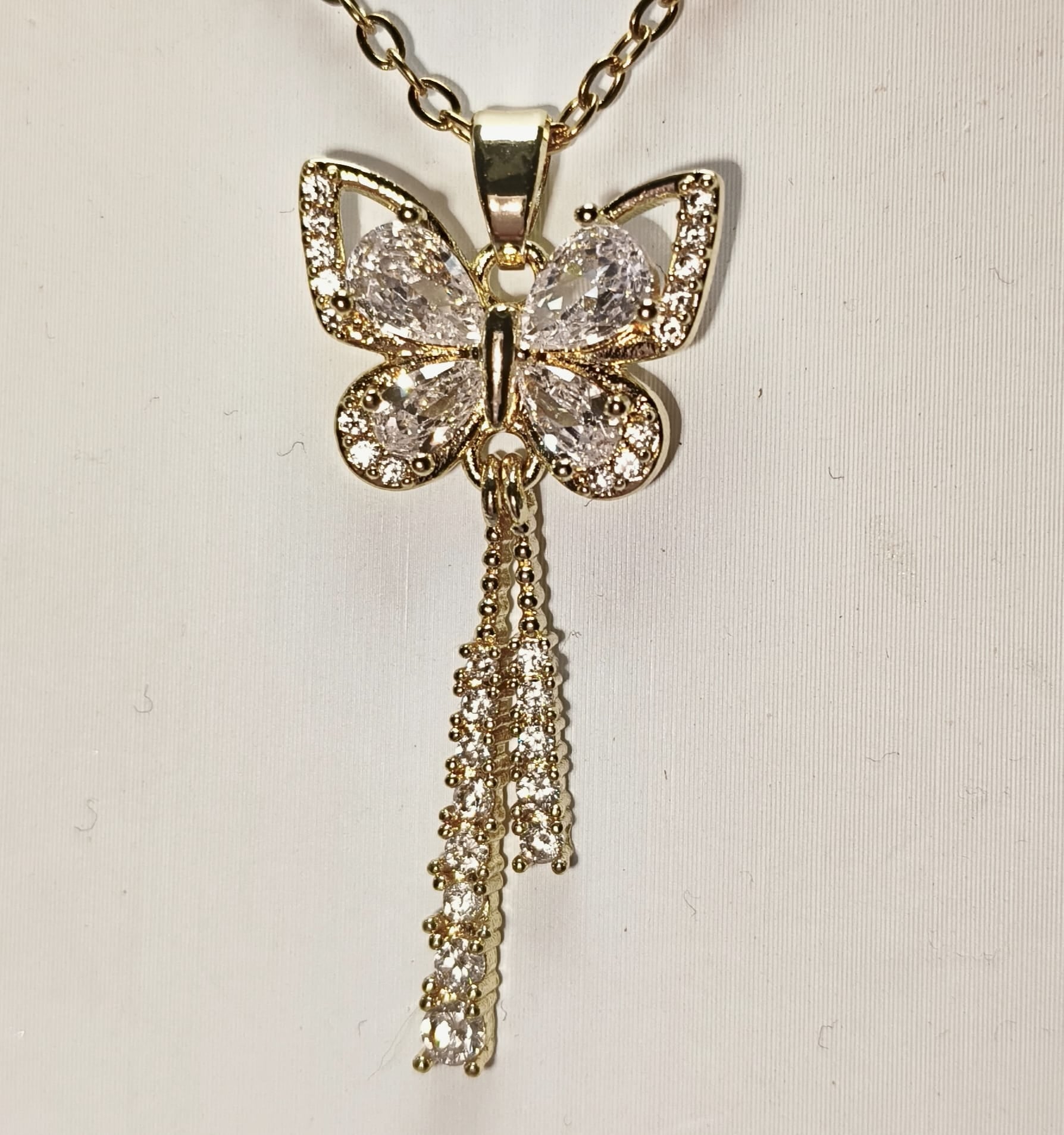 COLLANA MARIPOSA P/E 2026
